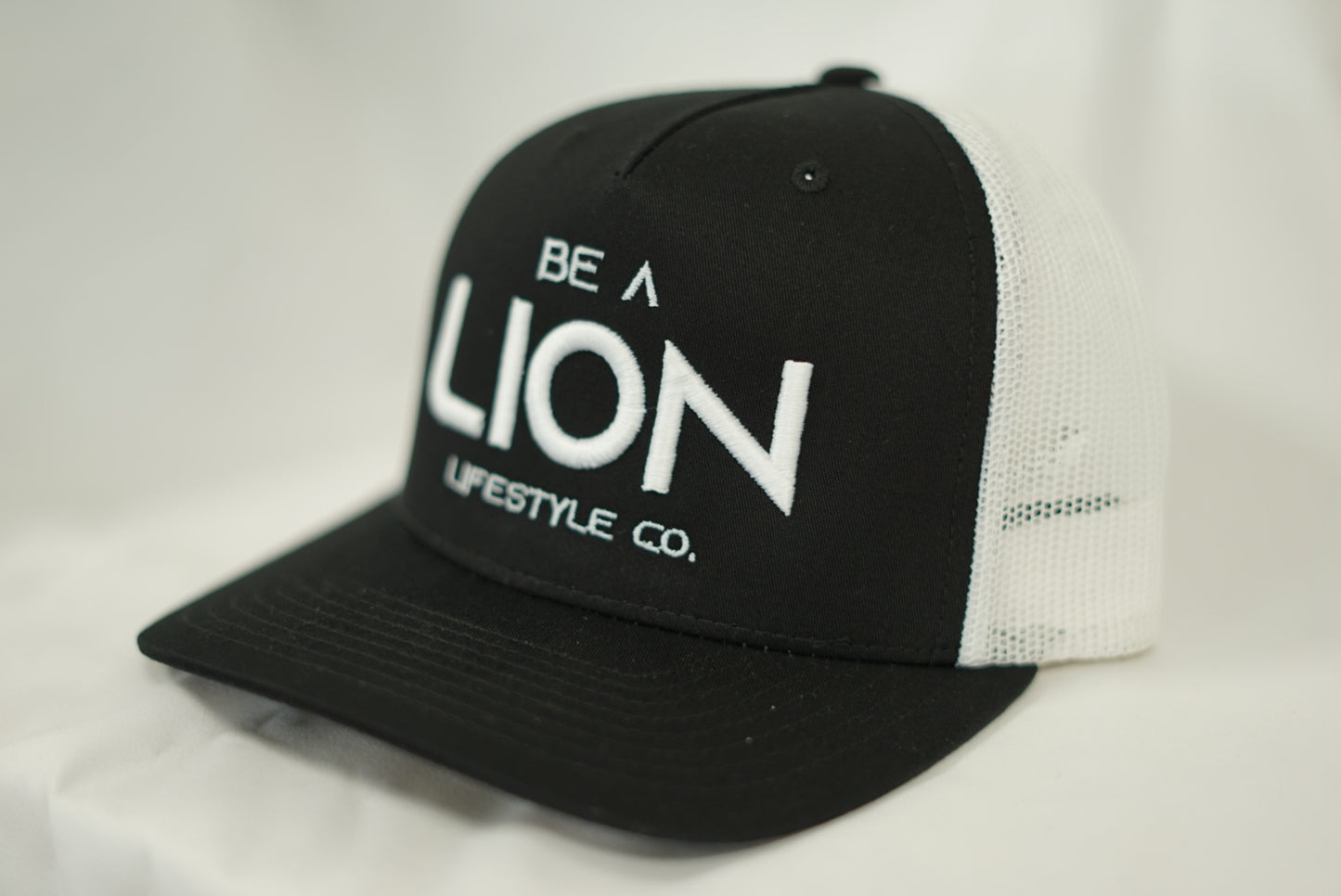 Curved Logo Trucker Hat